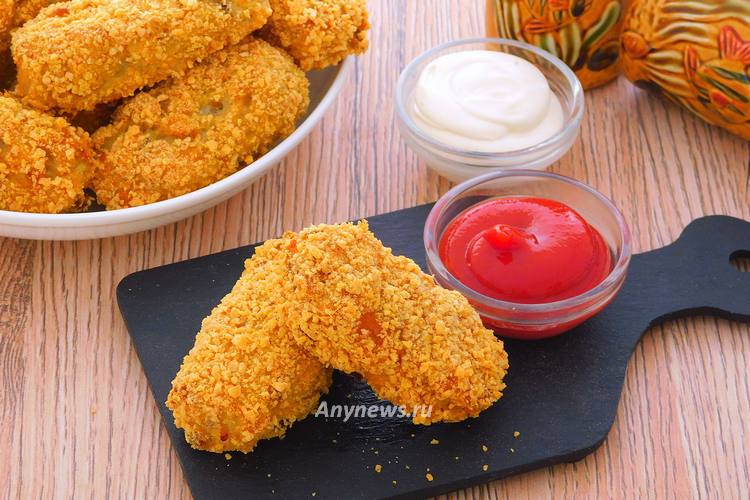 Выпекать рыбные палочки в панировке в духовке полчаса